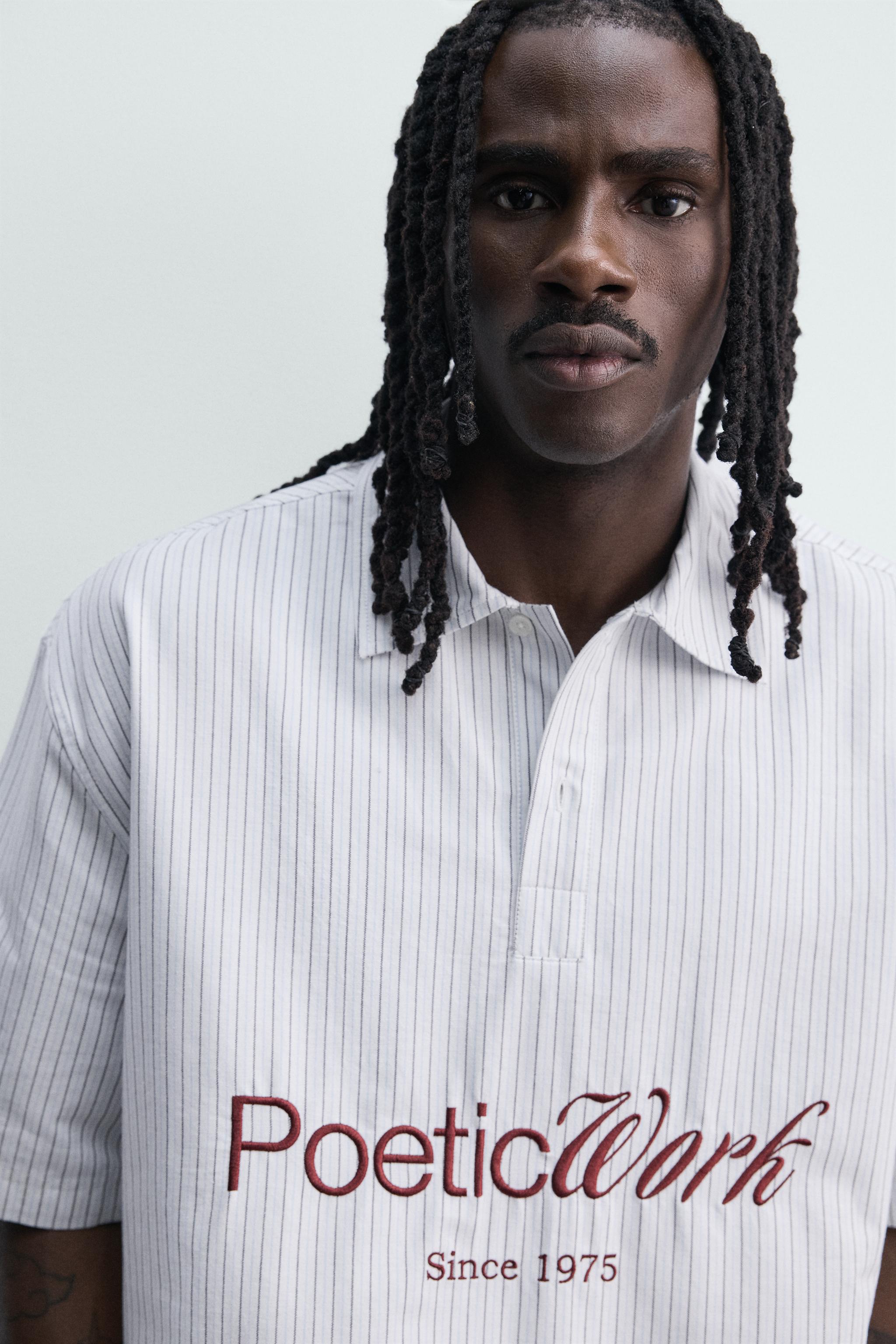 PRINTED TEXT BOXY FIT POLO SHIRT